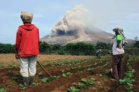 Why do people still live next to an active volcano?